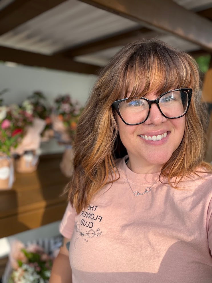 Rachel from Bits & Blooms Flower Farm with the Flower Stand during Mother's Day